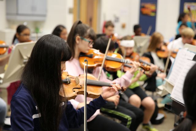 Discovery Middle School students in Orchestra class