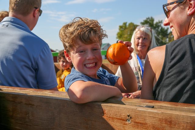 boy with pumpkin