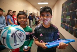 students with Sphero bots