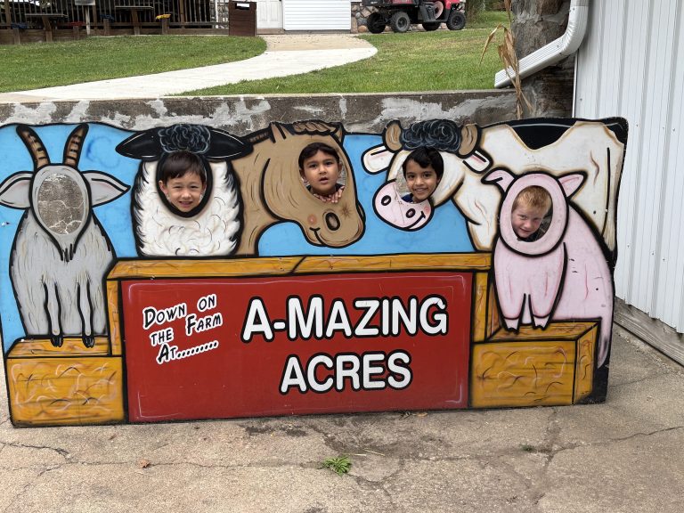 Sign reads "a amazing acres".