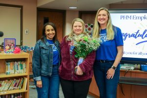 Carly Taylor with Northpoint Principal Lorraine White and other staff member